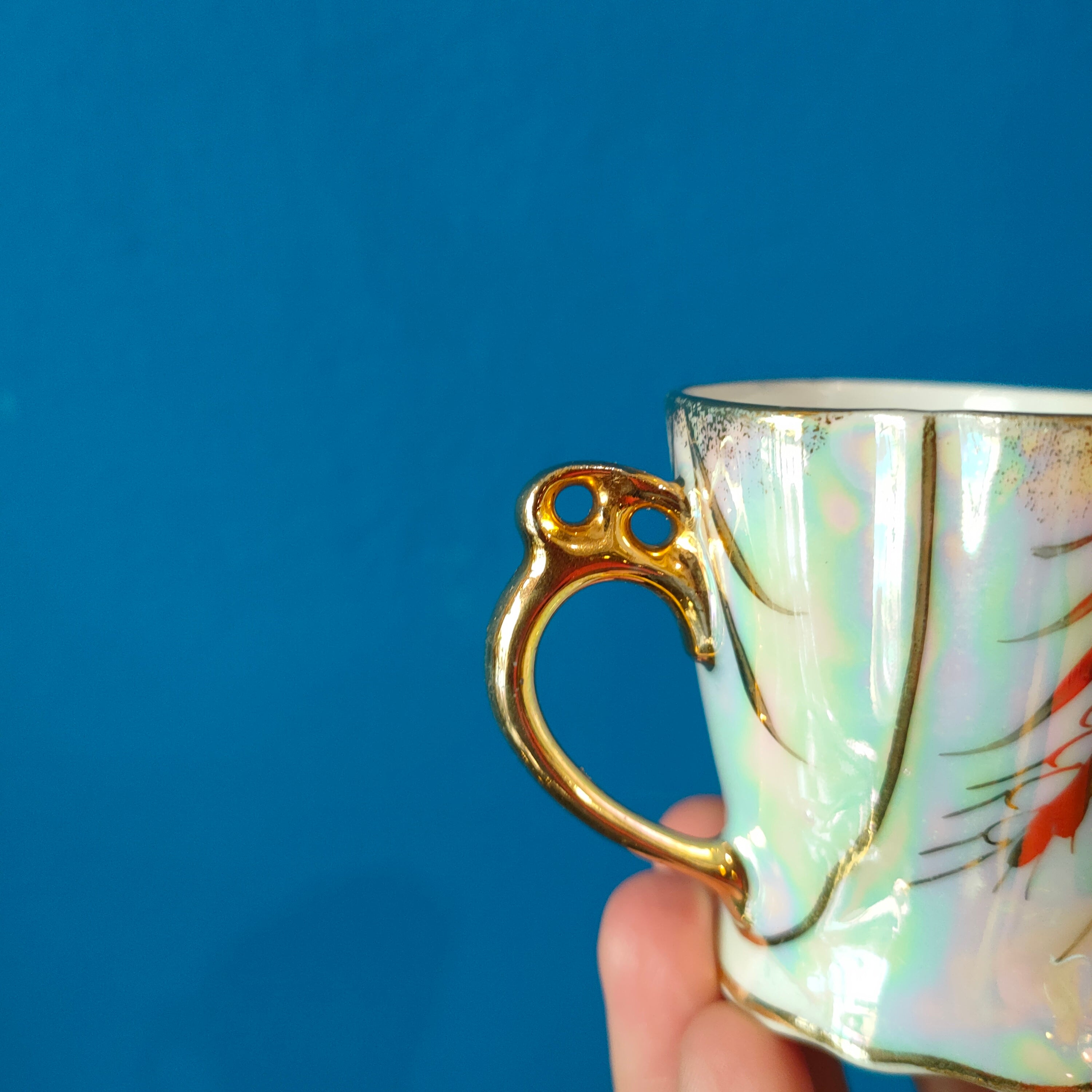 Tazzine in porcellana, decoro iridescente